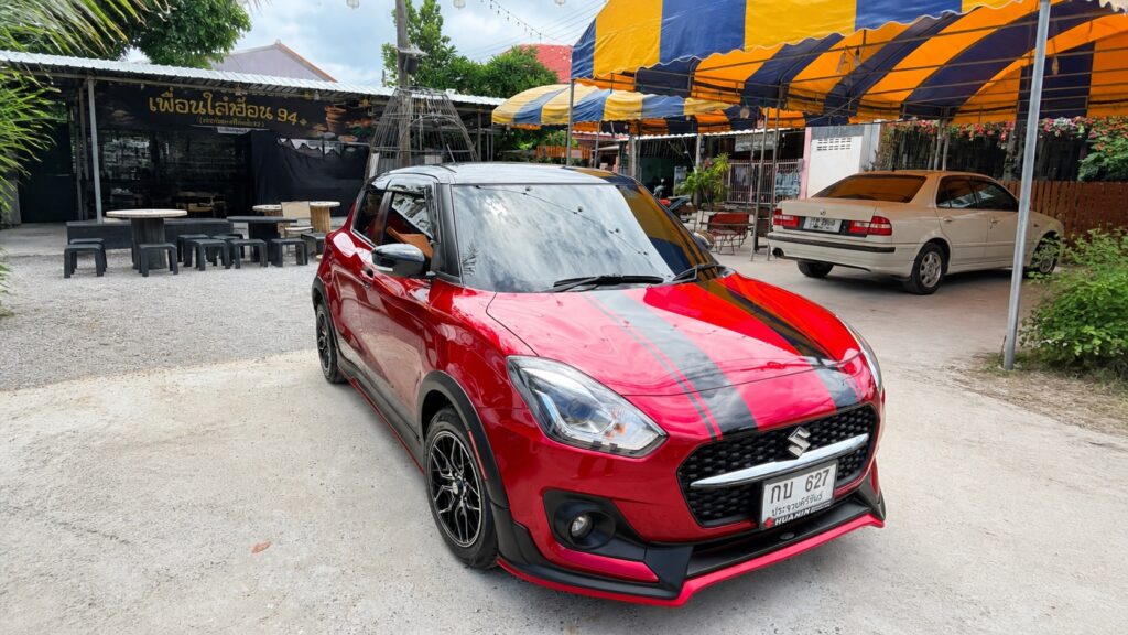 Red Suzuki Swift GLX available for car rental in Hua Hin