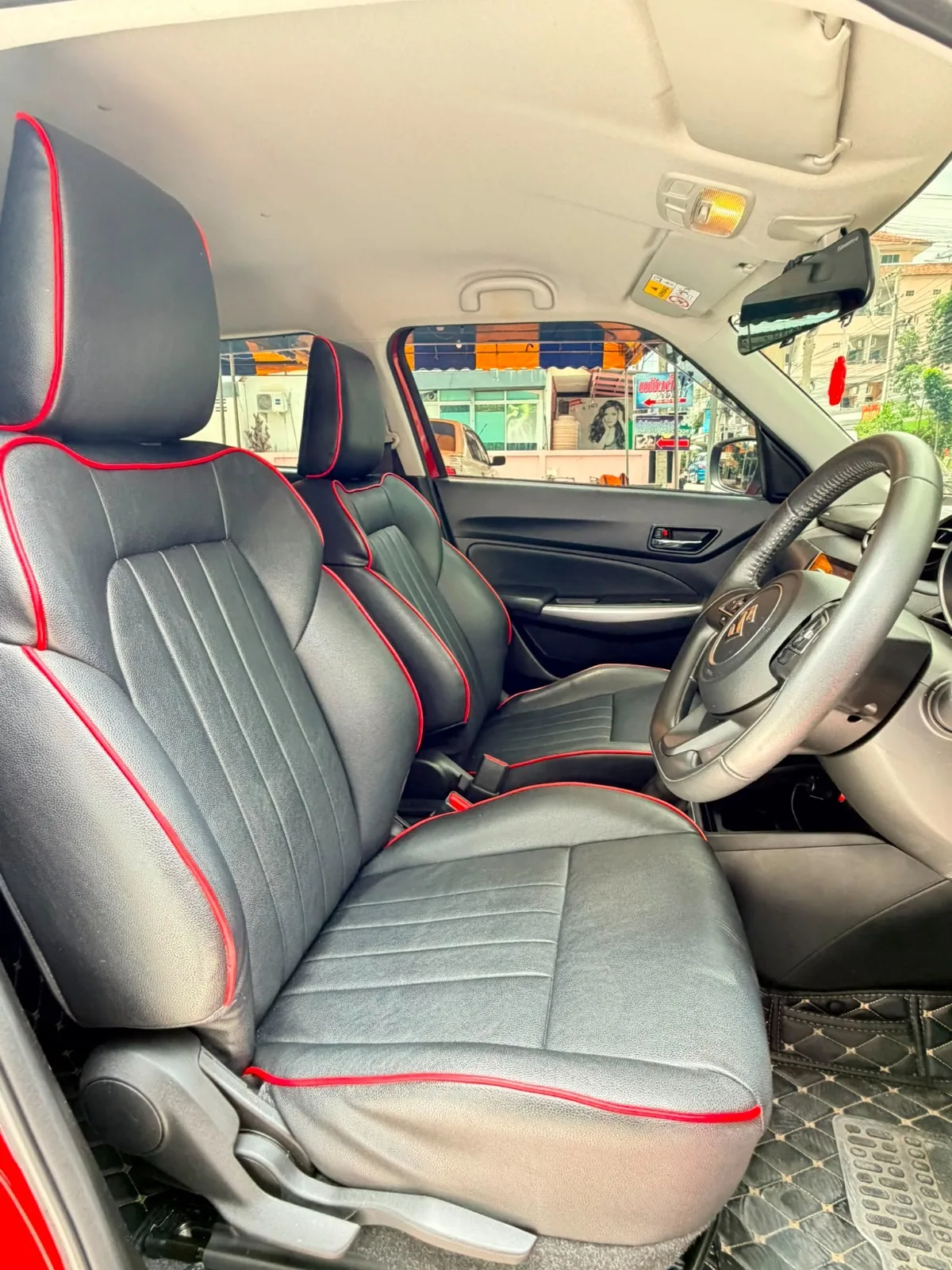 Suzuki Swift GLX front-seat interior for car rental in Hua Hin