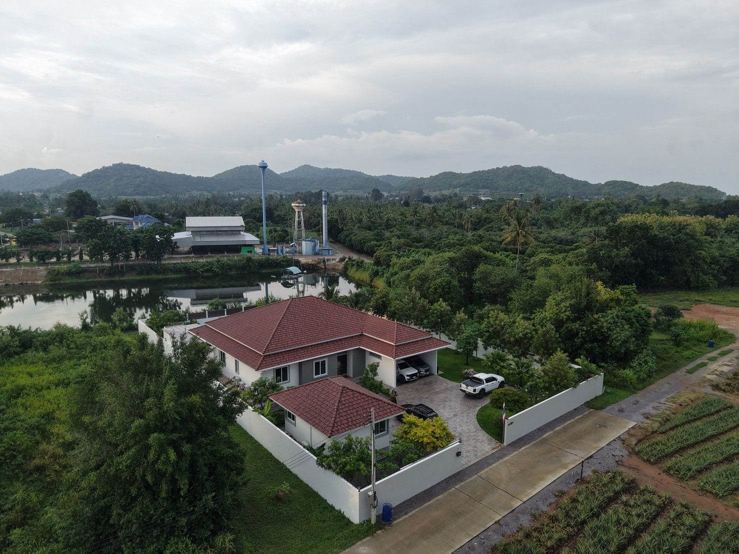 Aerial view of the villa in its peaceful Wang Phong setting
